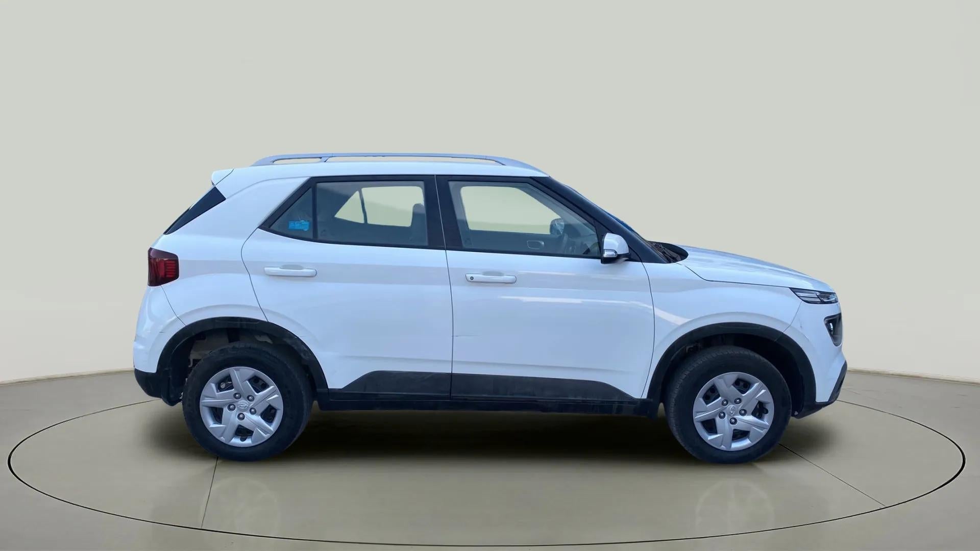 Side view of a Atlas White Hyundai Venue