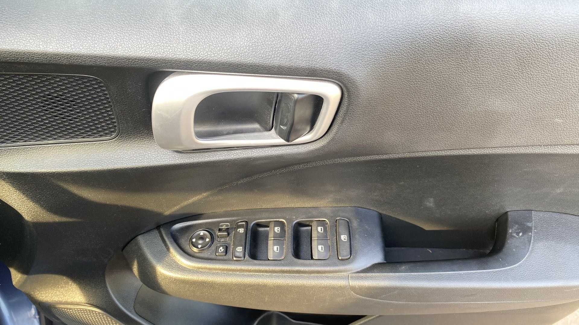 Driver door controls of a Hyundai Venue