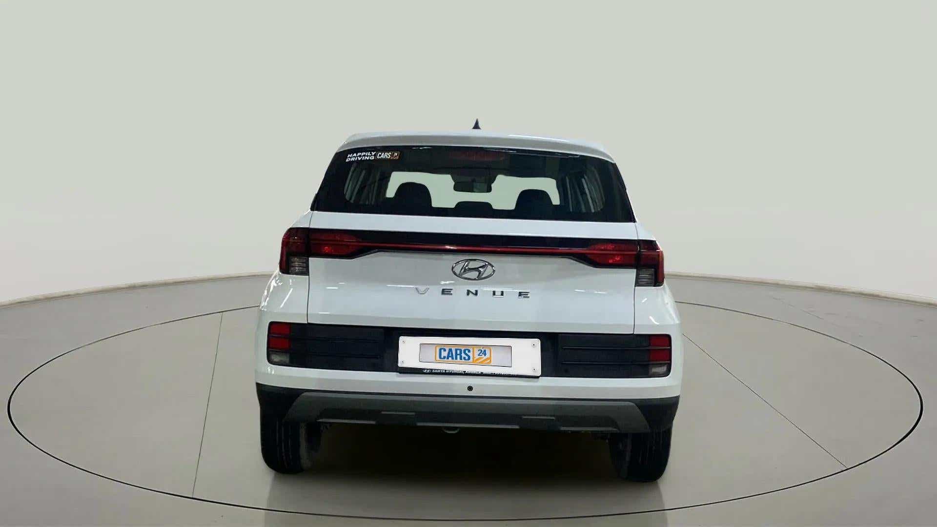 Rear view of a Atlas White Hyundai Venue