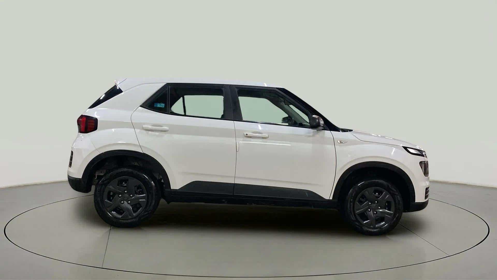 Side view of a Atlas White Hyundai Venue