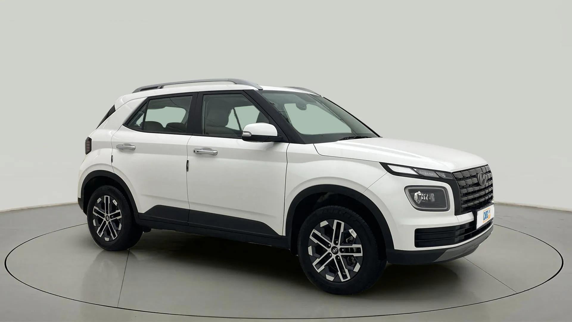 Front three-quarter of a Atlas White Hyundai Venue