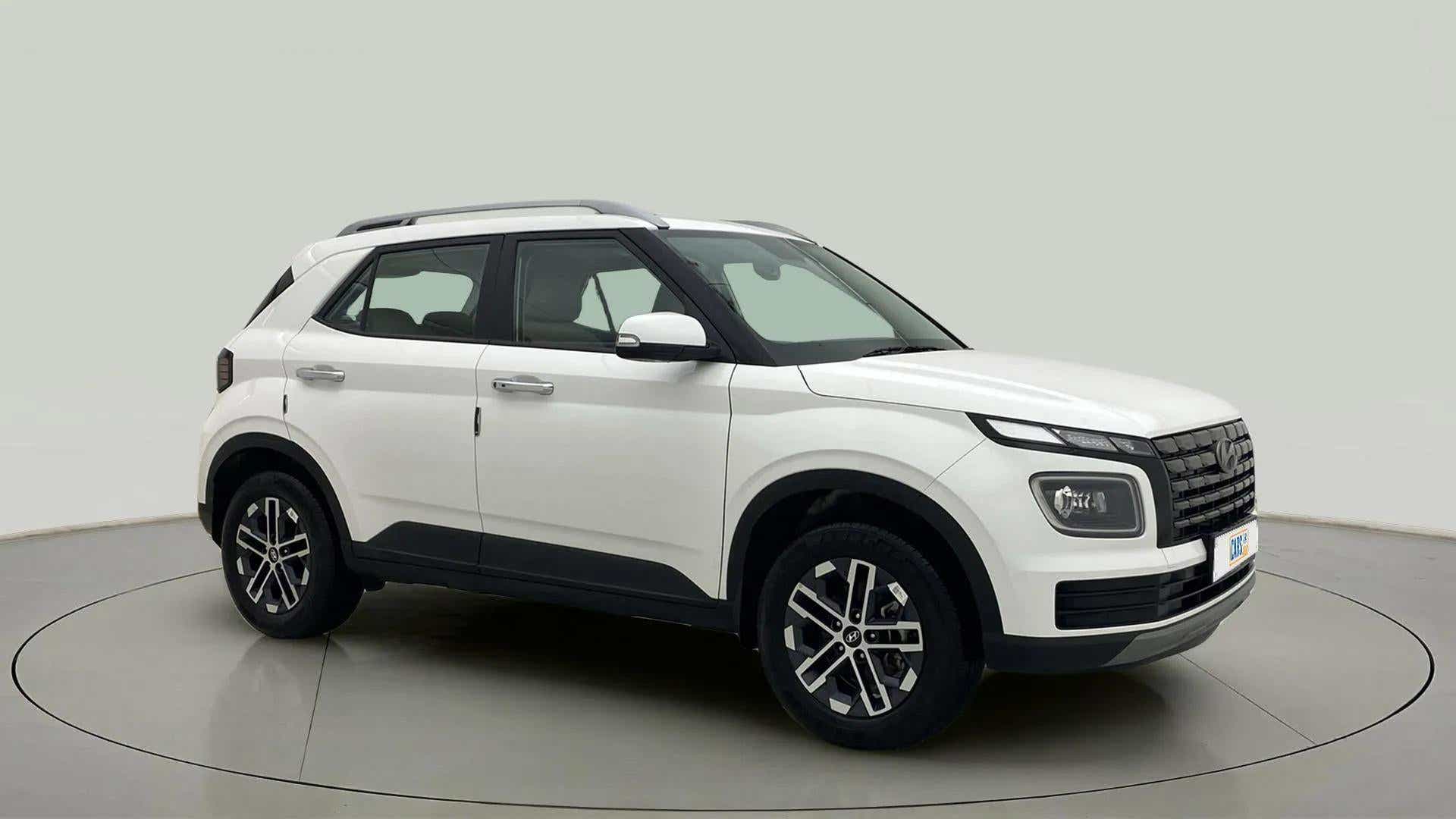 Front three-quarter of a Atlas White Hyundai Venue