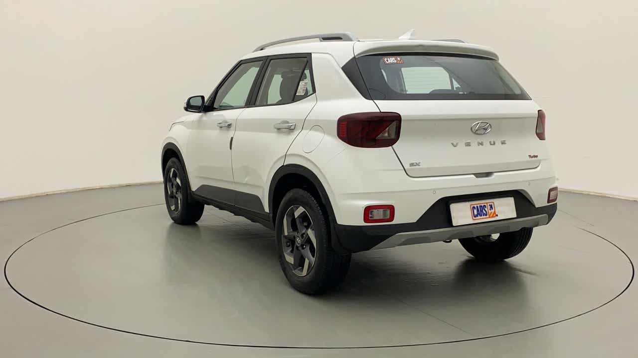 Rear three-quarter view of a Atlas White Hyundai Venue SX Turbo