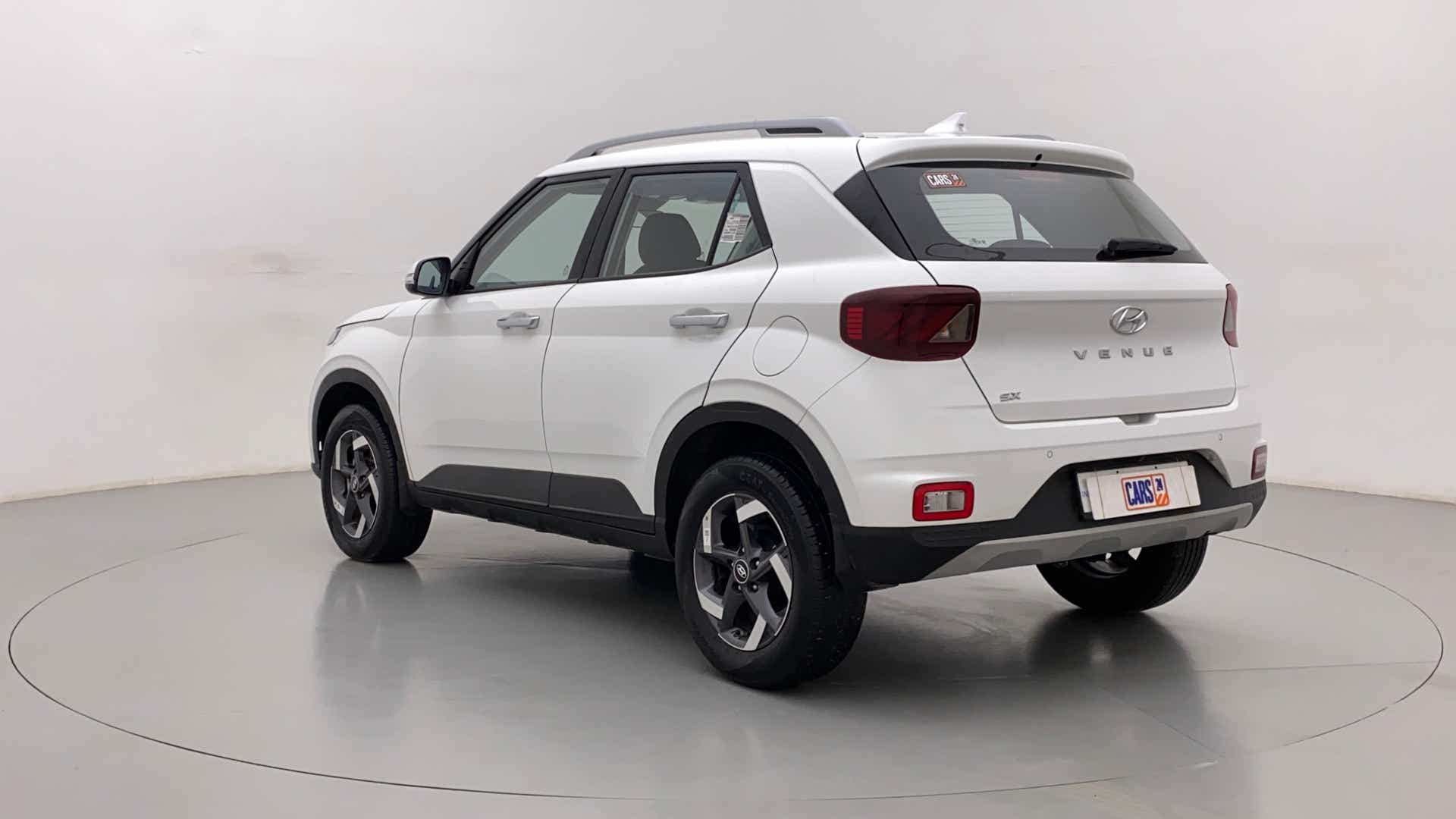 Rear three-quarter of a Atlas White Hyundai Venue SX
