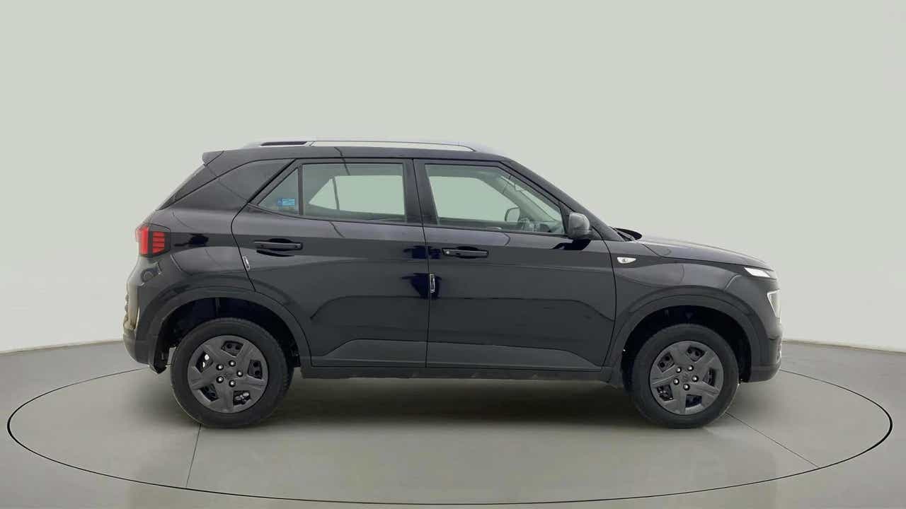 Side view of a Abyss Black Hyundai Venue