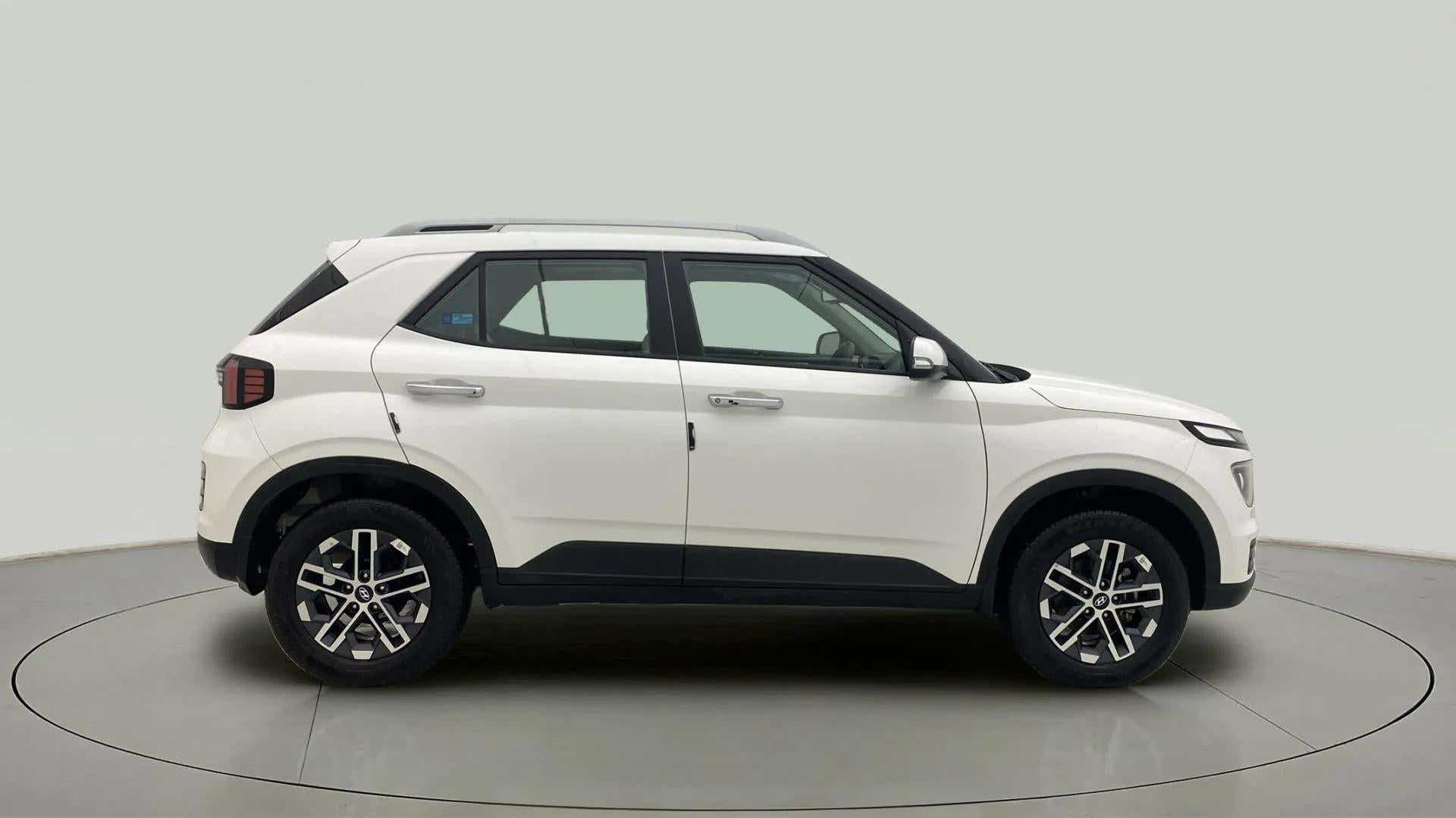 Side view of a Atlas White Hyundai Venue