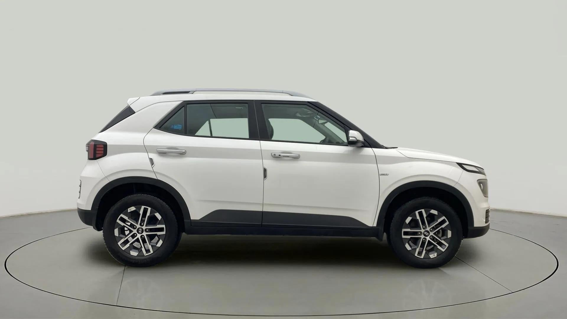 Side view of a Atlas White Hyundai Venue