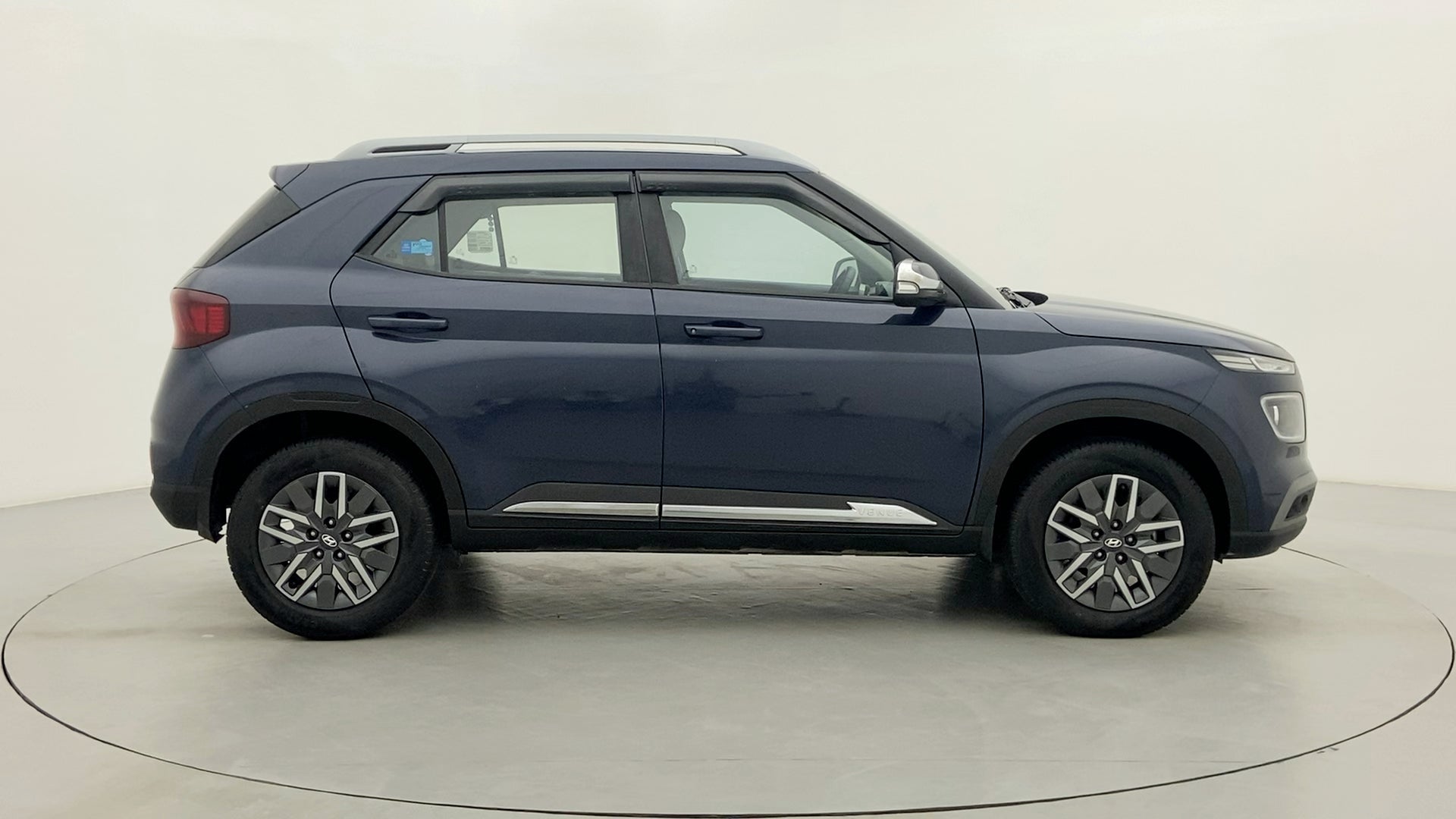 Side view of a Denim Blue Hyundai Venue