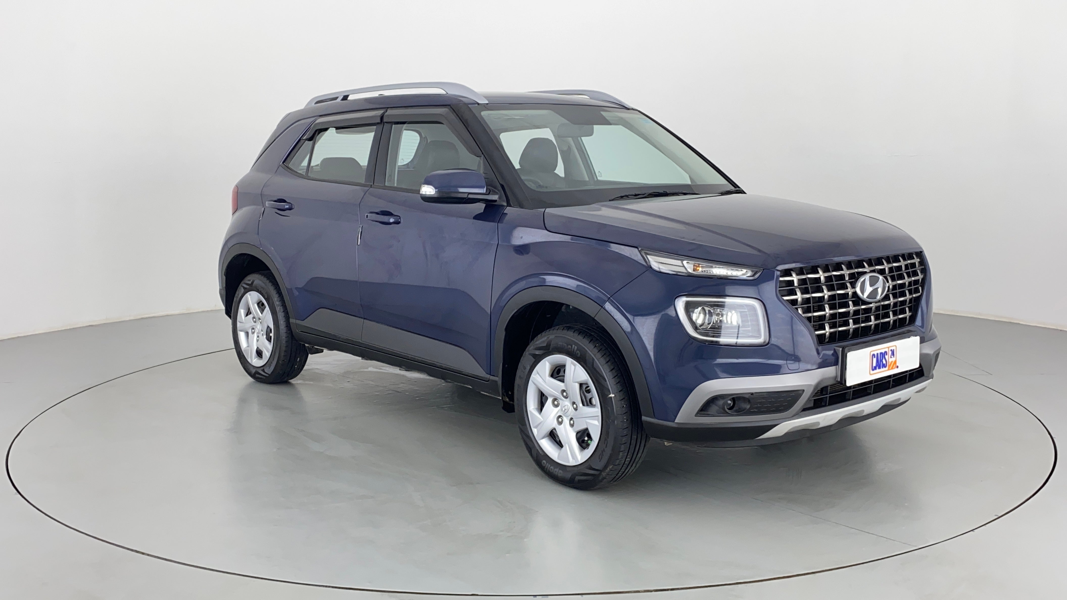 Front three-quarter view of a Denim Blue Hyundai Venue