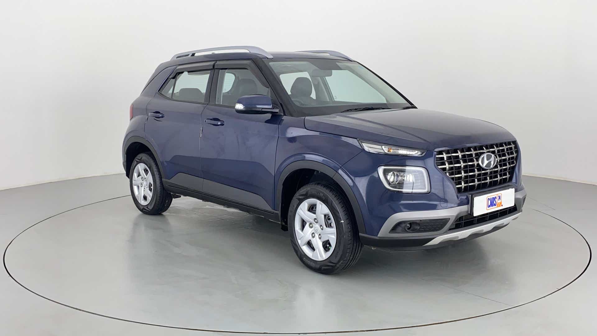 Front three-quarter view of a Denim Blue Hyundai Venue