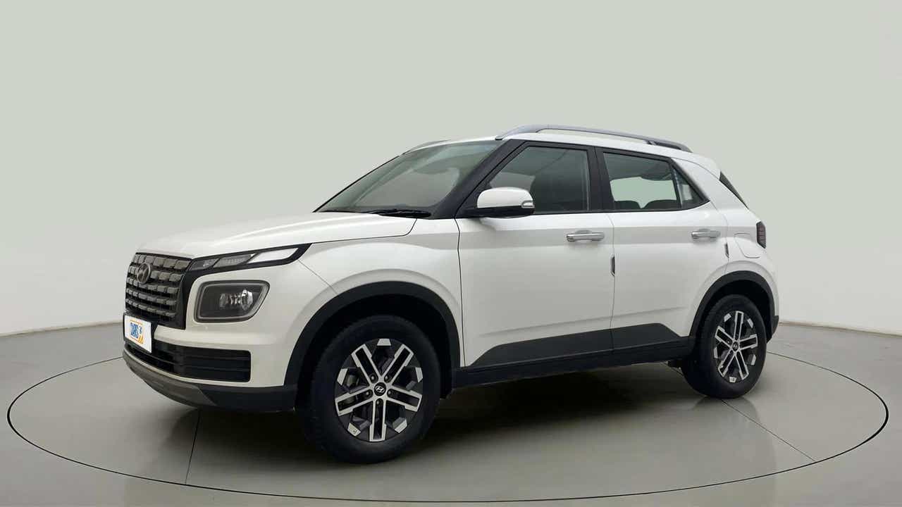 Front three-quarter view of a atlas white Hyundai Venue