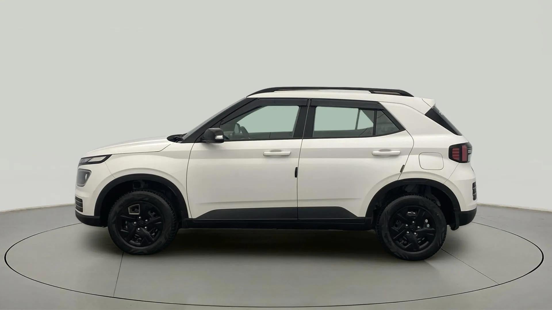 Side view of a Atlas White Hyundai Venue