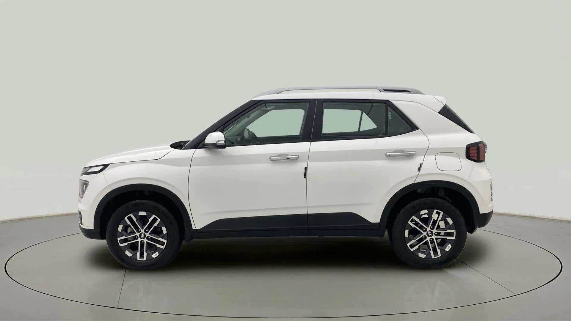 Side view of a Atlas White Hyundai Venue