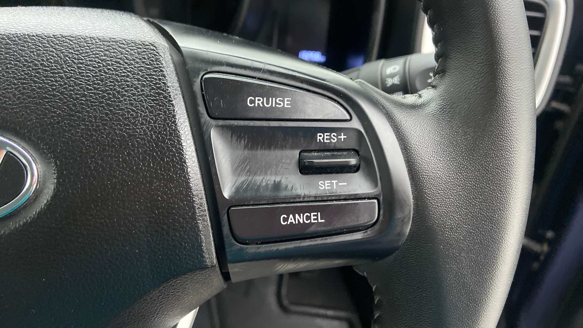 Cruise control buttons on a Hyundai Venue steering wheel