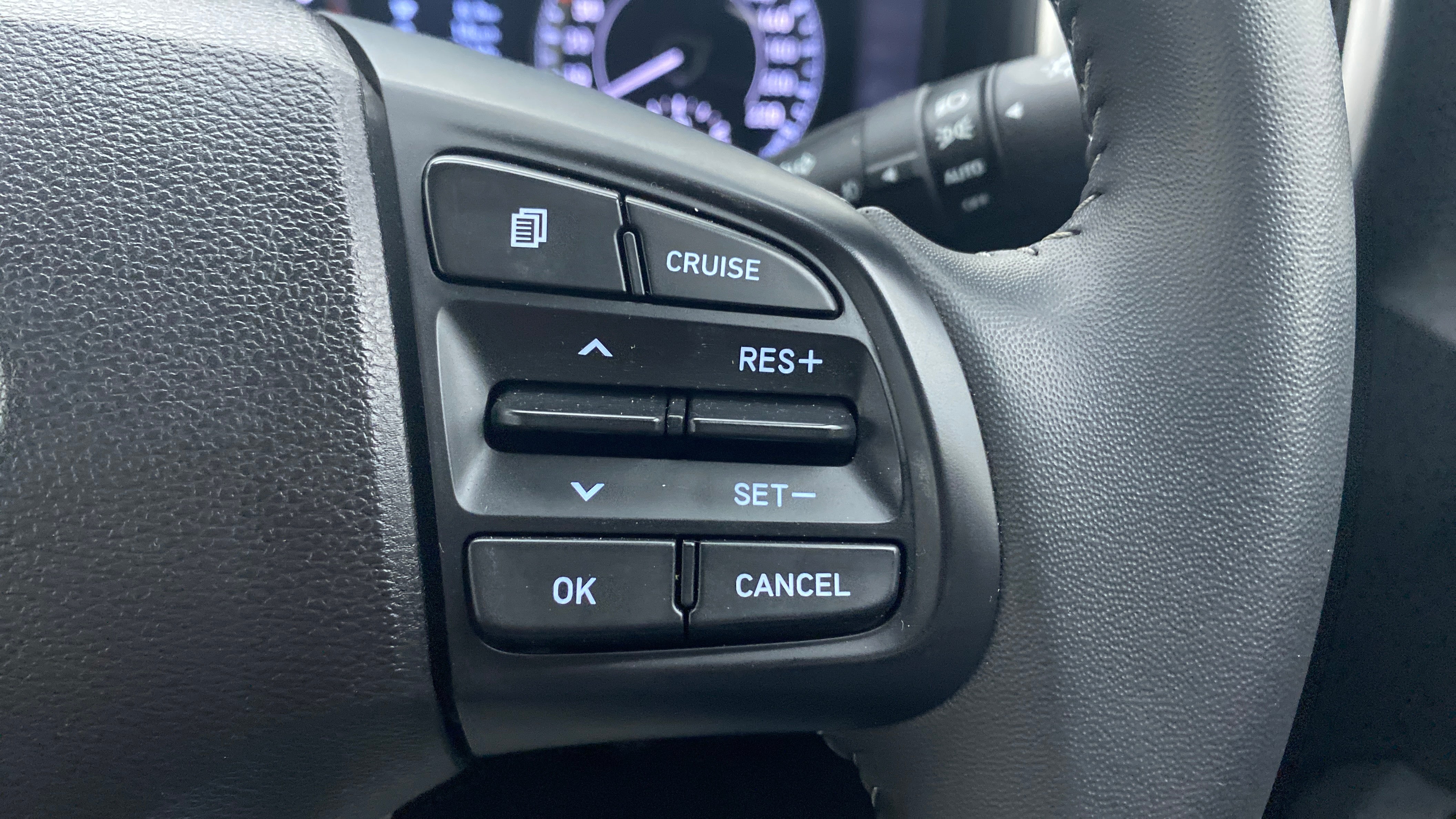 Steering wheel cruise control buttons of a Hyundai Venue