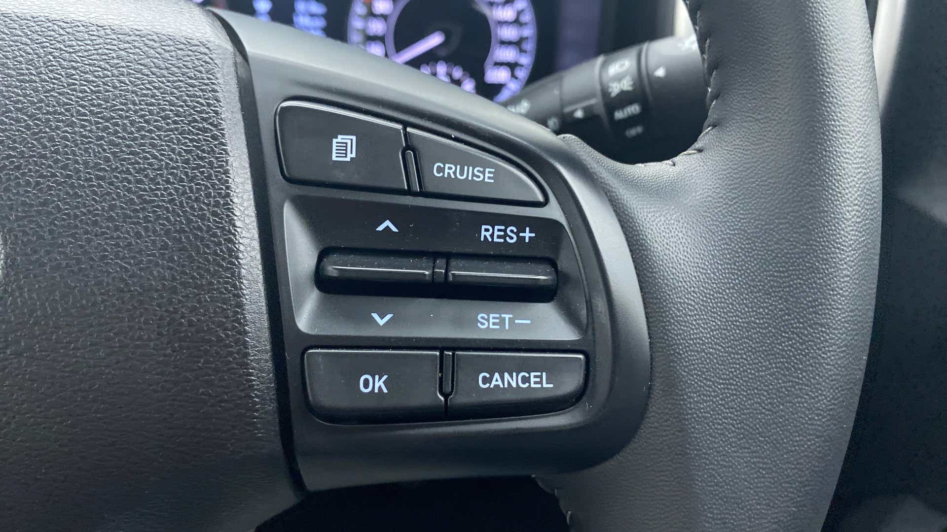 Steering wheel cruise control buttons of a Hyundai Venue