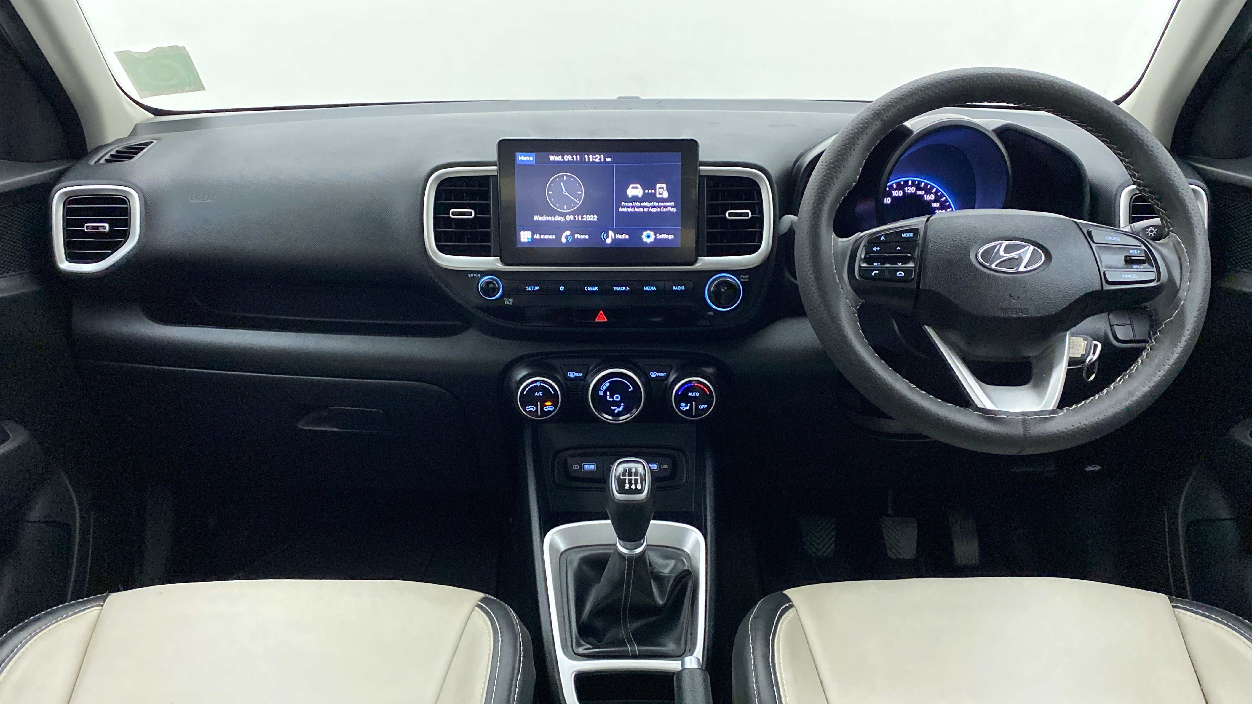 Dashboard and steering wheel view of a Hyundai Venue