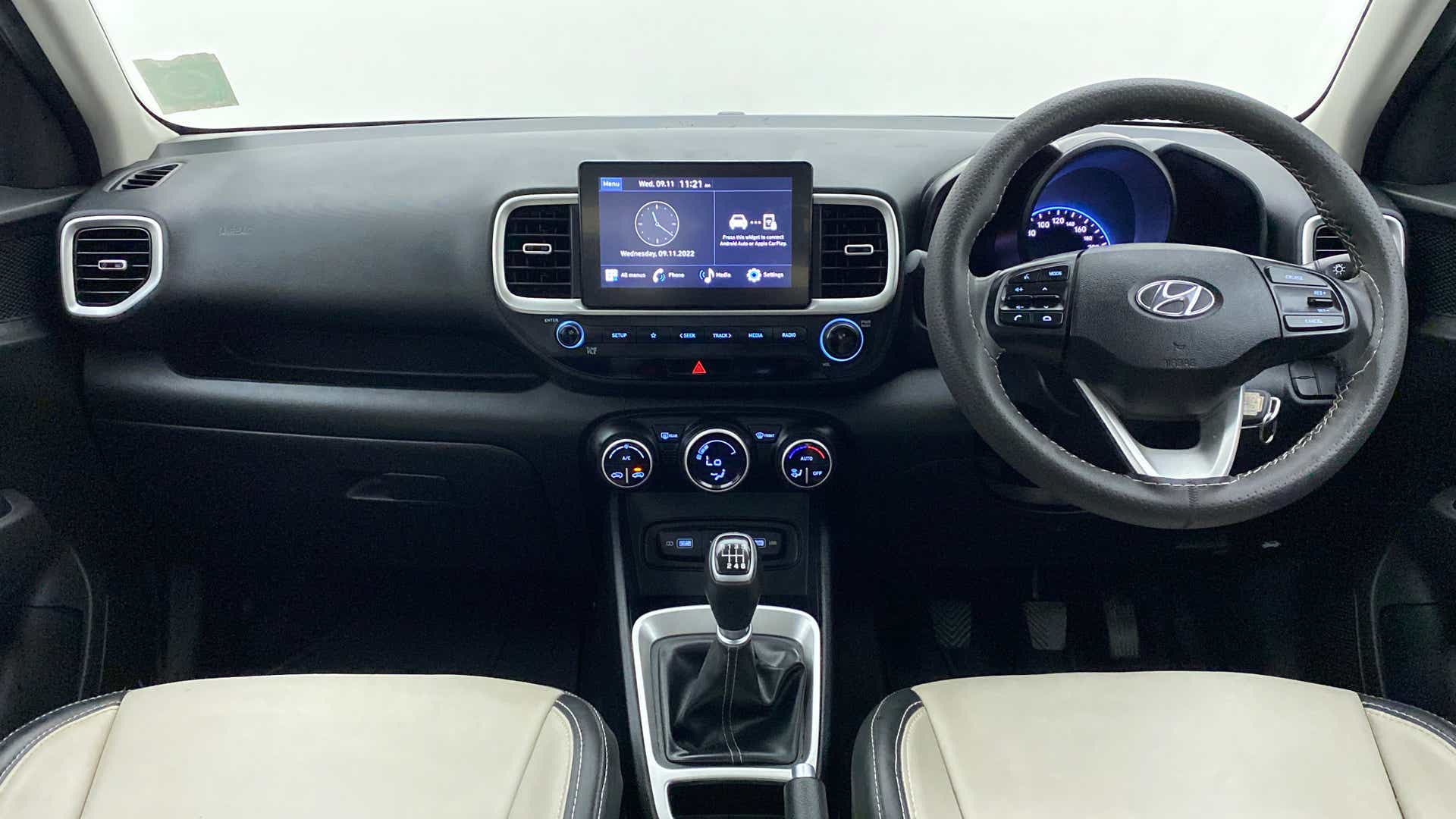 Dashboard and steering wheel view of a Hyundai Venue