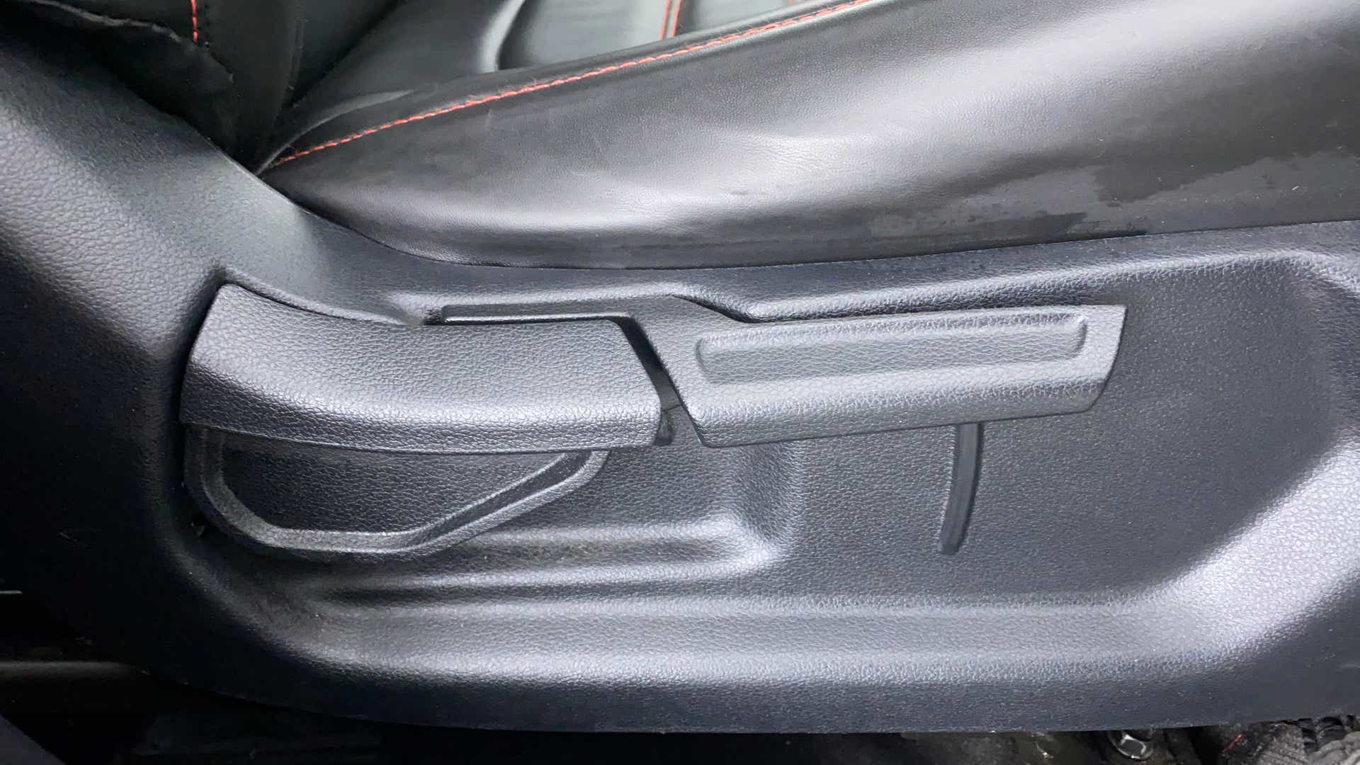 Close-up of a seat adjustment lever in a Hyundai Venue