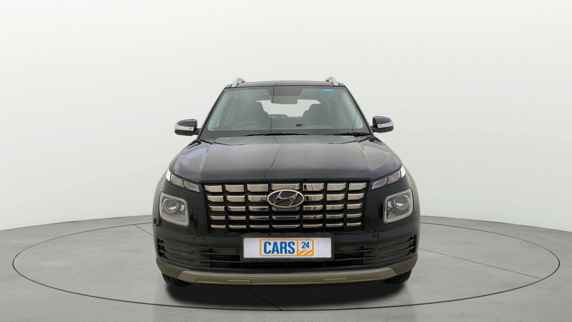 Front view of a Abyss Black Hyundai Venue