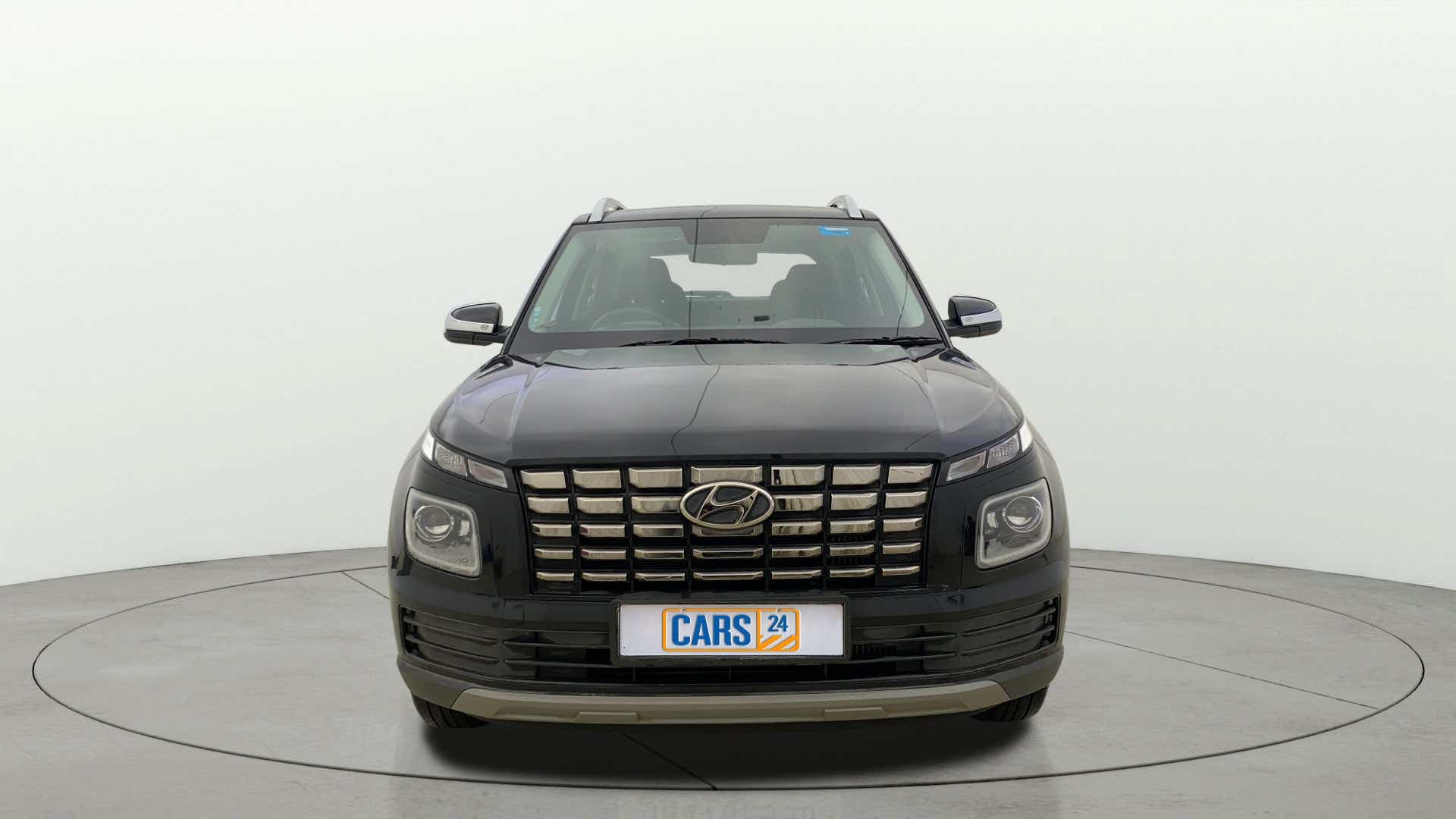 Front view of a Abyss Black Hyundai Venue