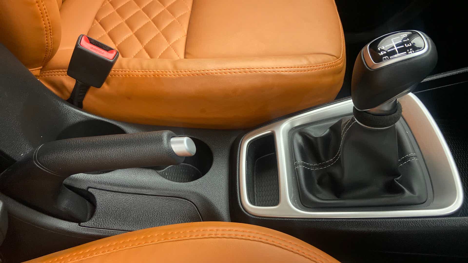 Gear shift and handbrake area of a Hyundai Venue