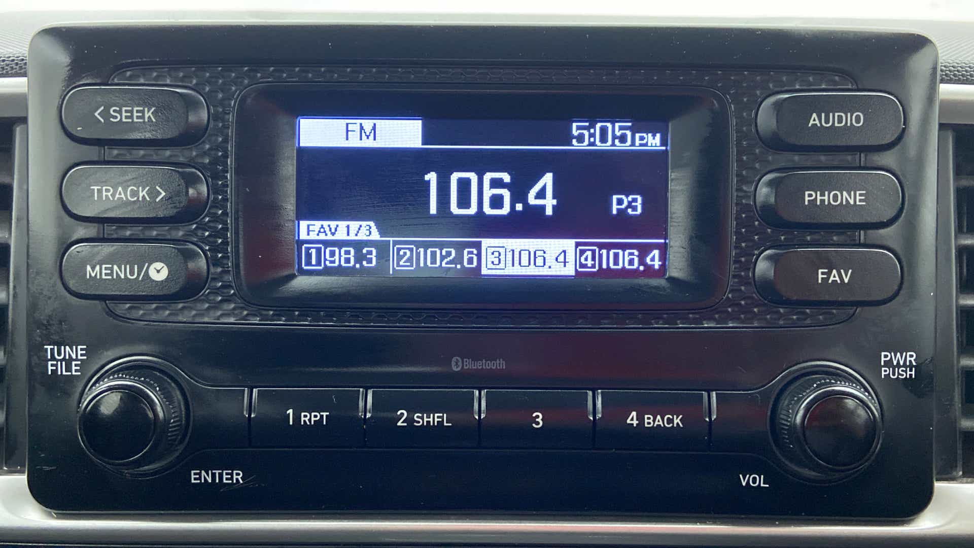 Close-up of a Hyundai Venue car stereo FM radio display