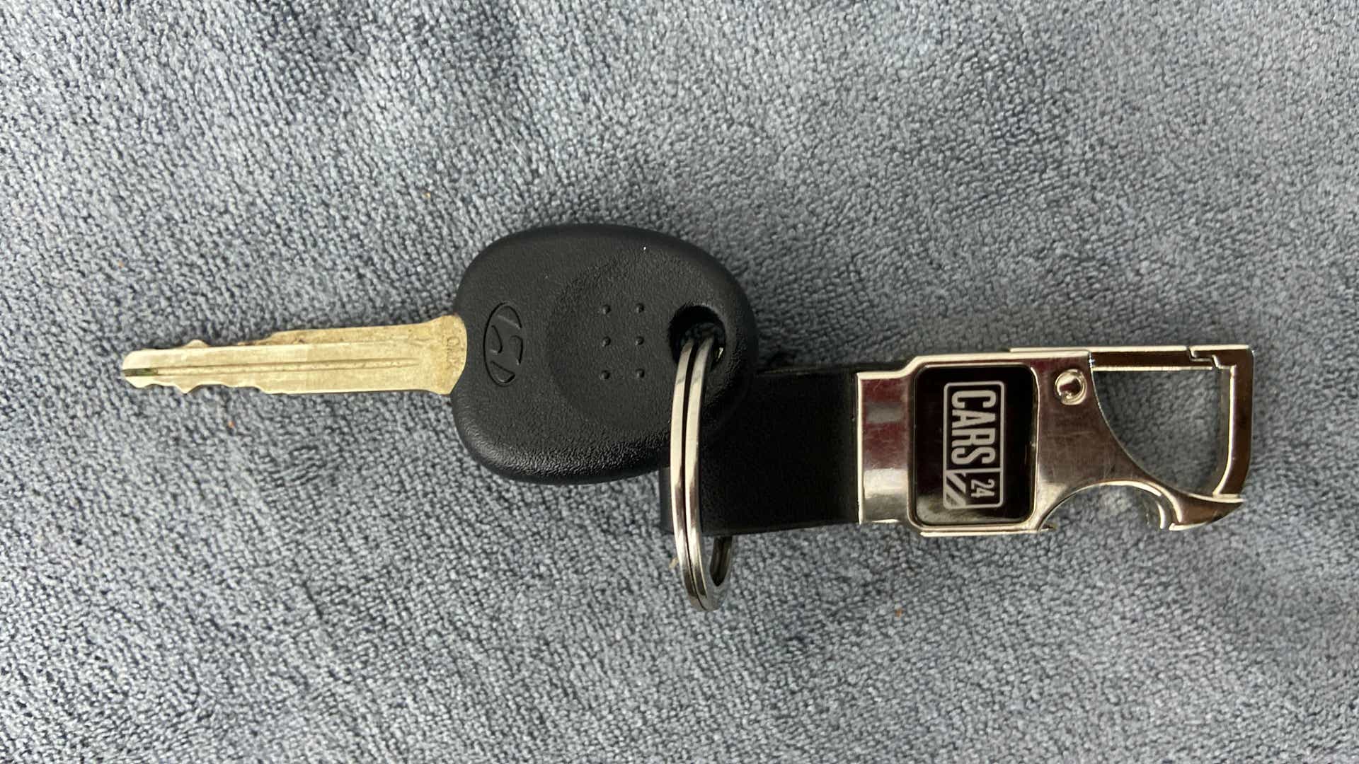 Close-up of a Hyundai Venue key with keychain