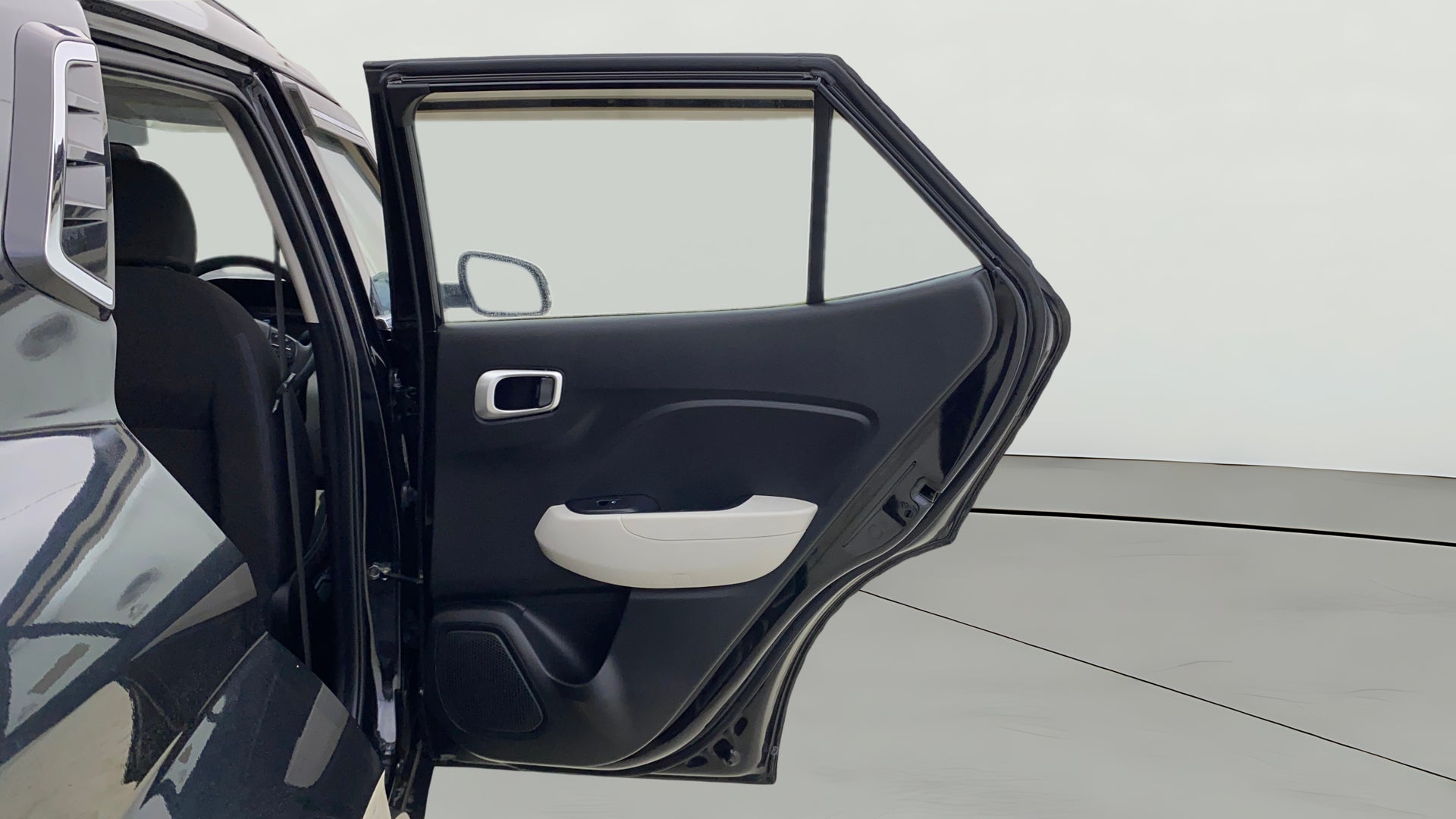 Rear door interior view of a Hyundai Venue