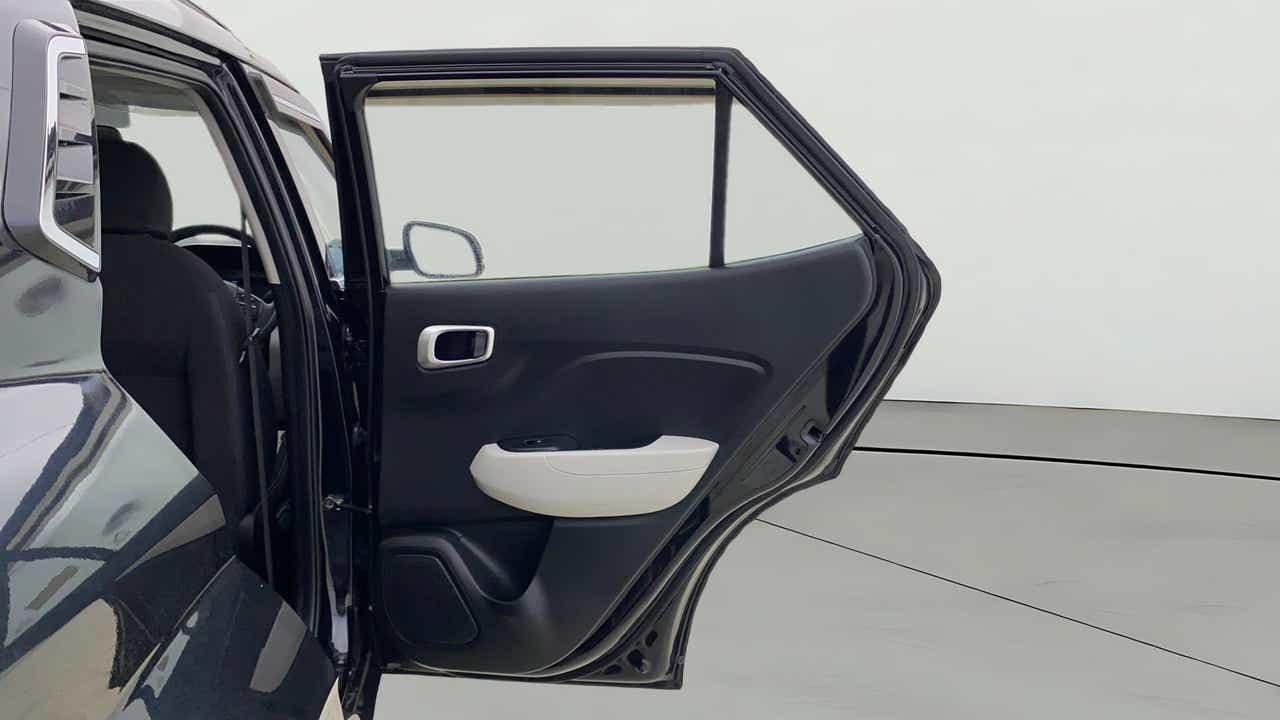 Rear door interior view of a Hyundai Venue