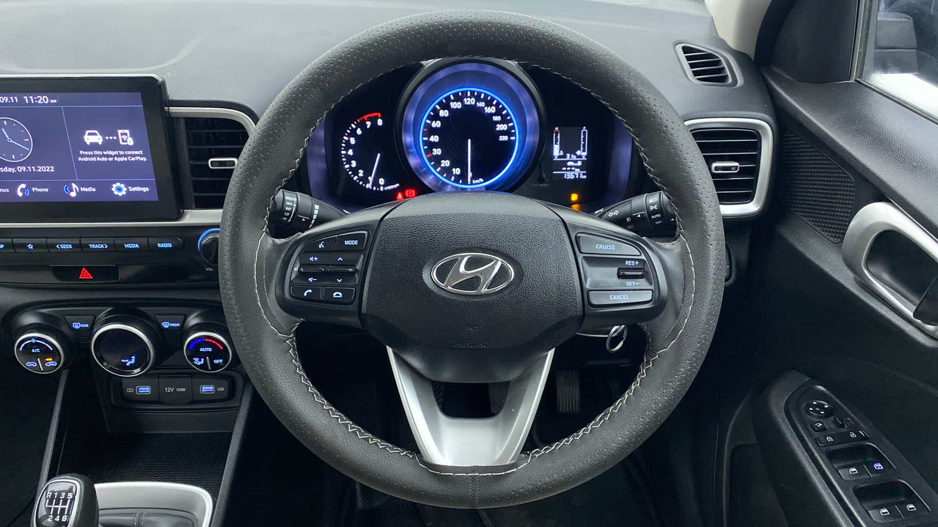 Steering wheel and dashboard of a Hyundai Venue interior