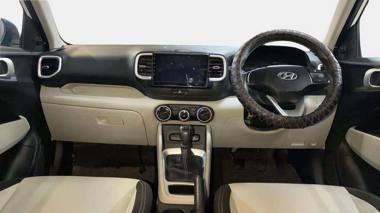 Dashboard and steering wheel view of a Hyundai Venue