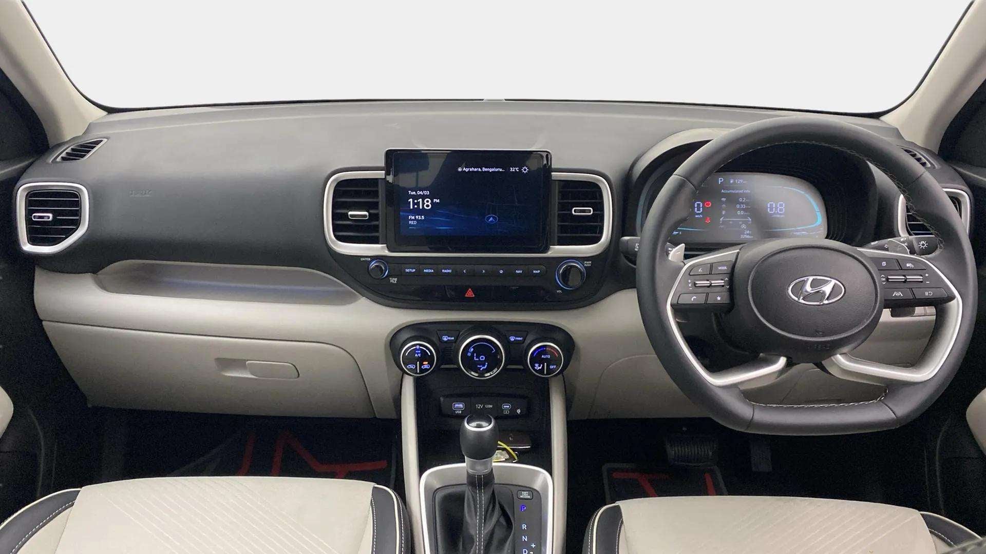 Dashboard and steering wheel view of a Hyundai Venue