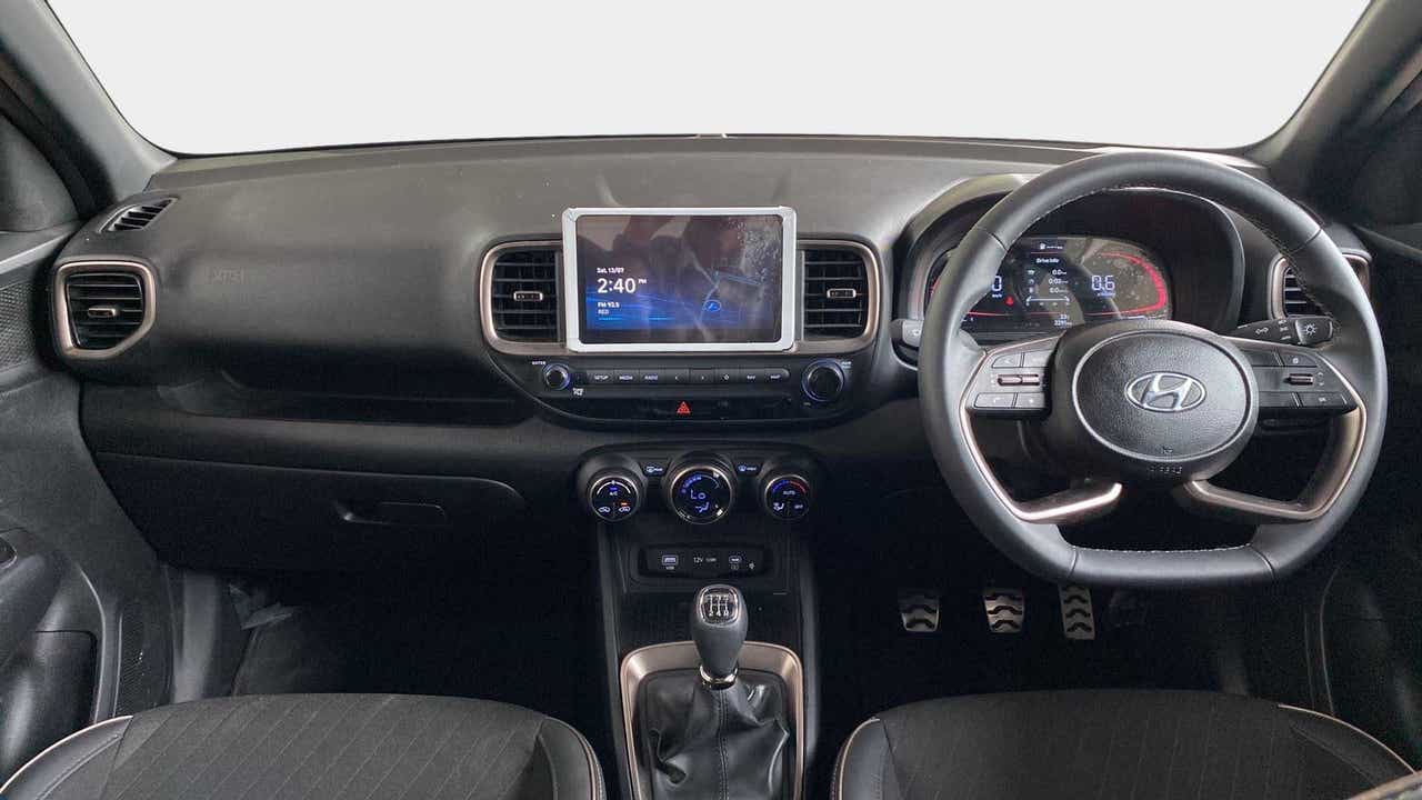 Dashboard and steering wheel view of a Hyundai Venue