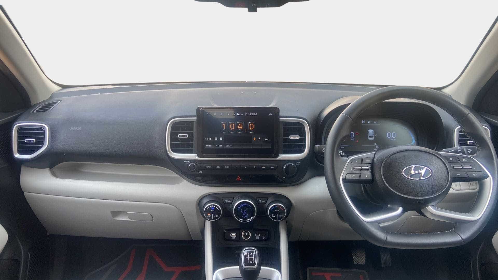 Dashboard and steering wheel view of a Hyundai Venue