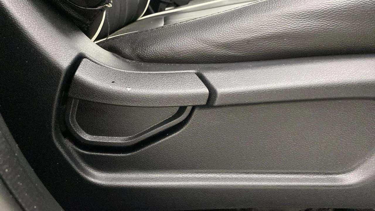 Close-up of the seat adjustment lever in a Hyundai Venue