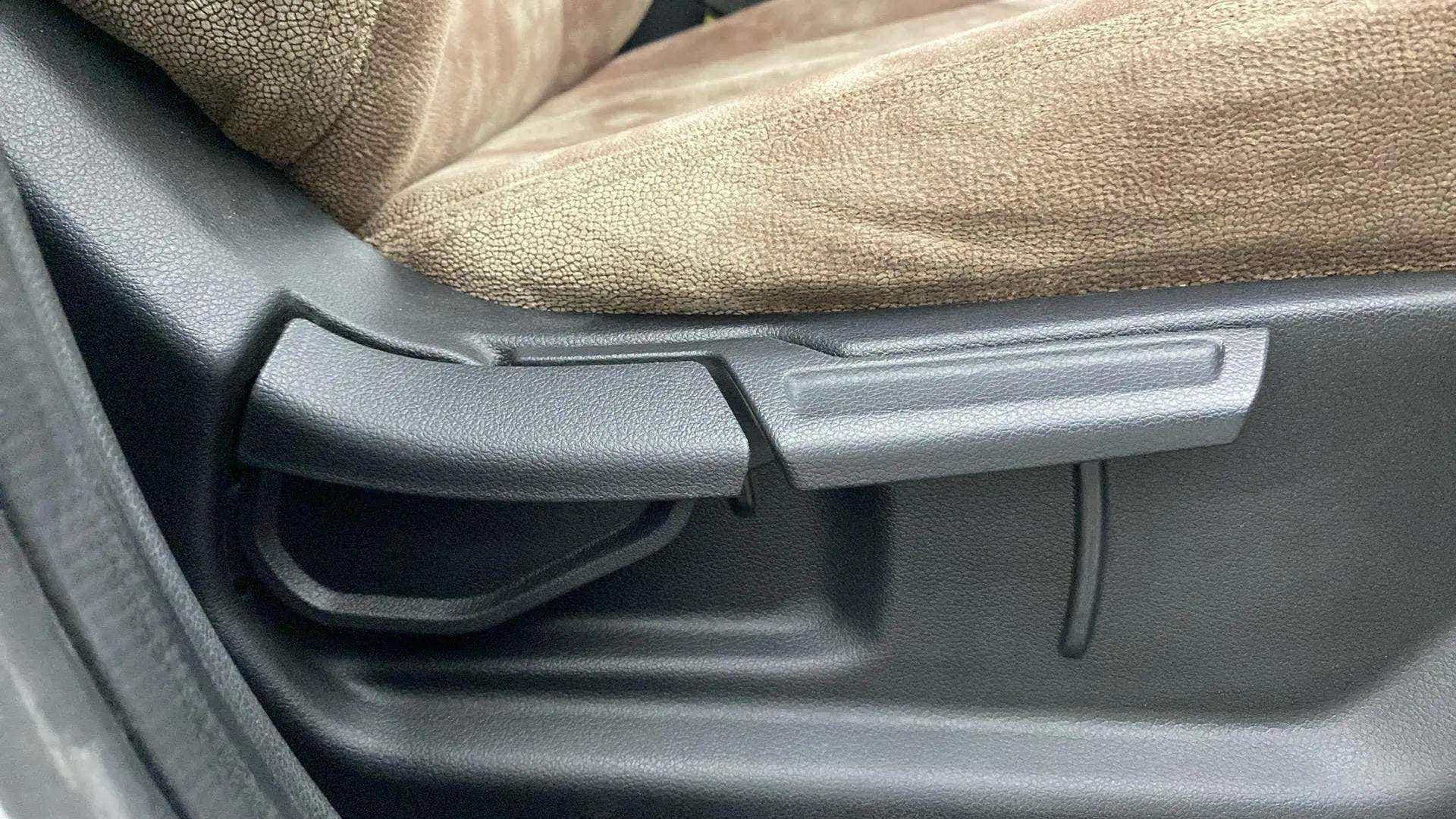 Close-up of driver's seat adjustment lever of a Hyundai Venue