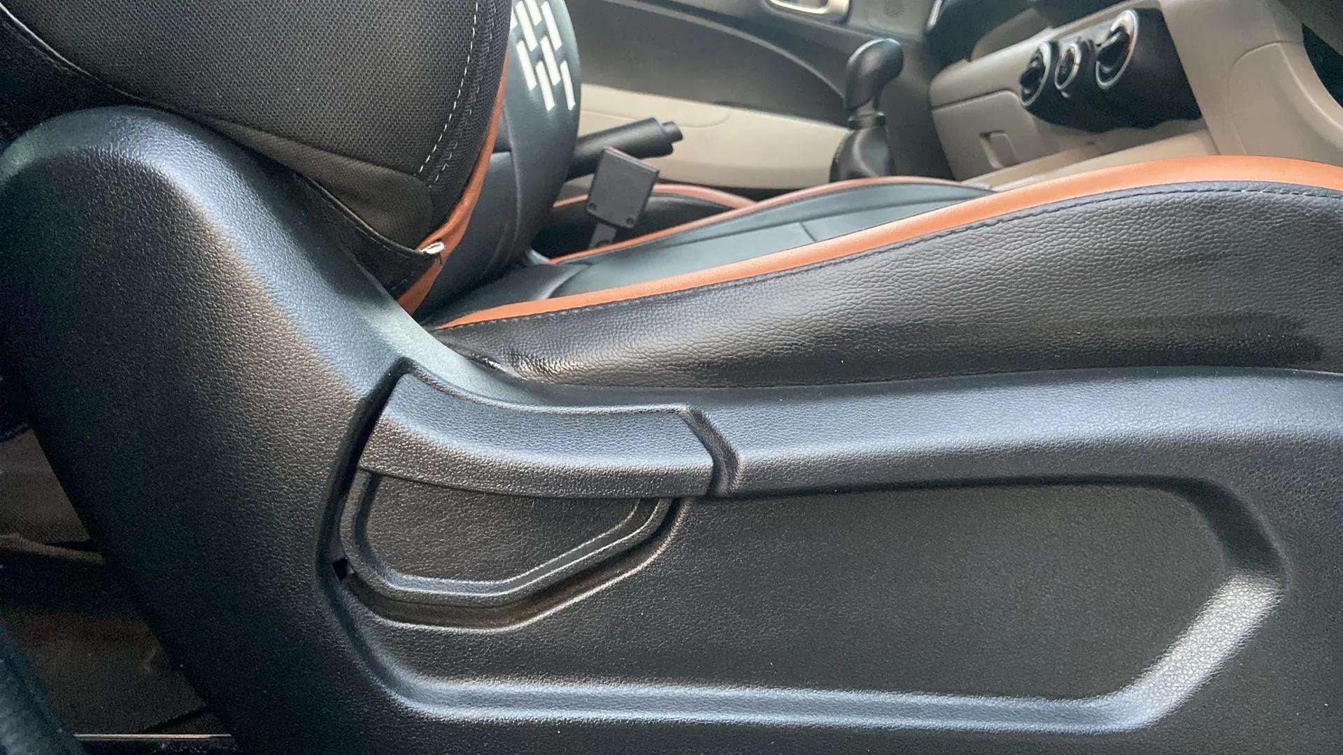 Close-up of the seat adjustment lever in a Hyundai Venue interior