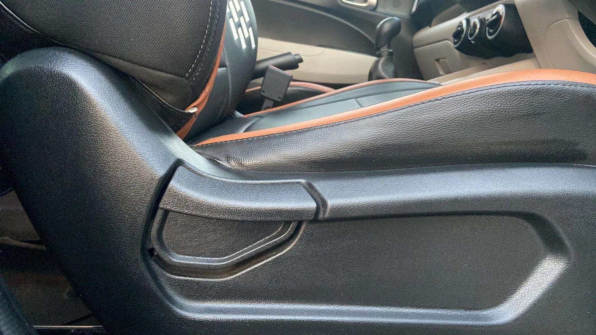 Close-up of the seat adjustment lever in a Hyundai Venue interior