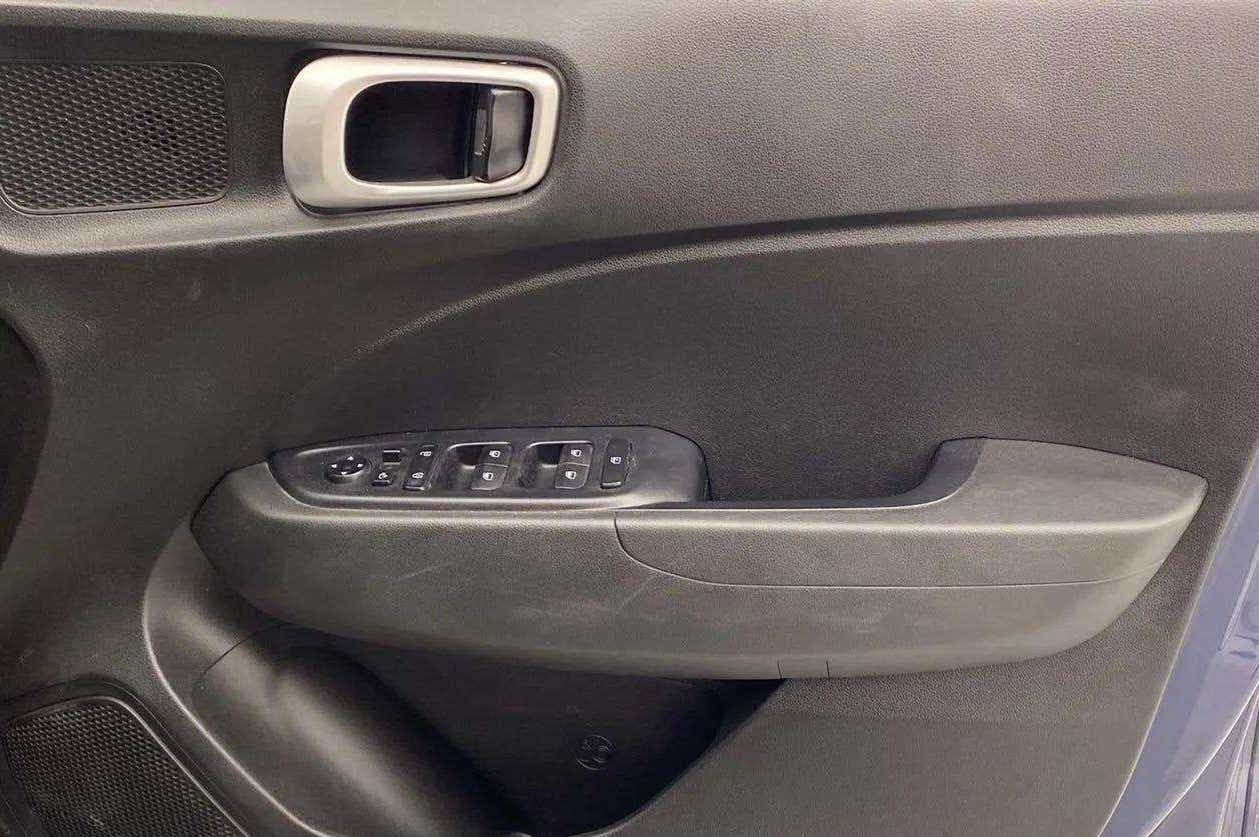 Interior driver door controls of a Hyundai Venue