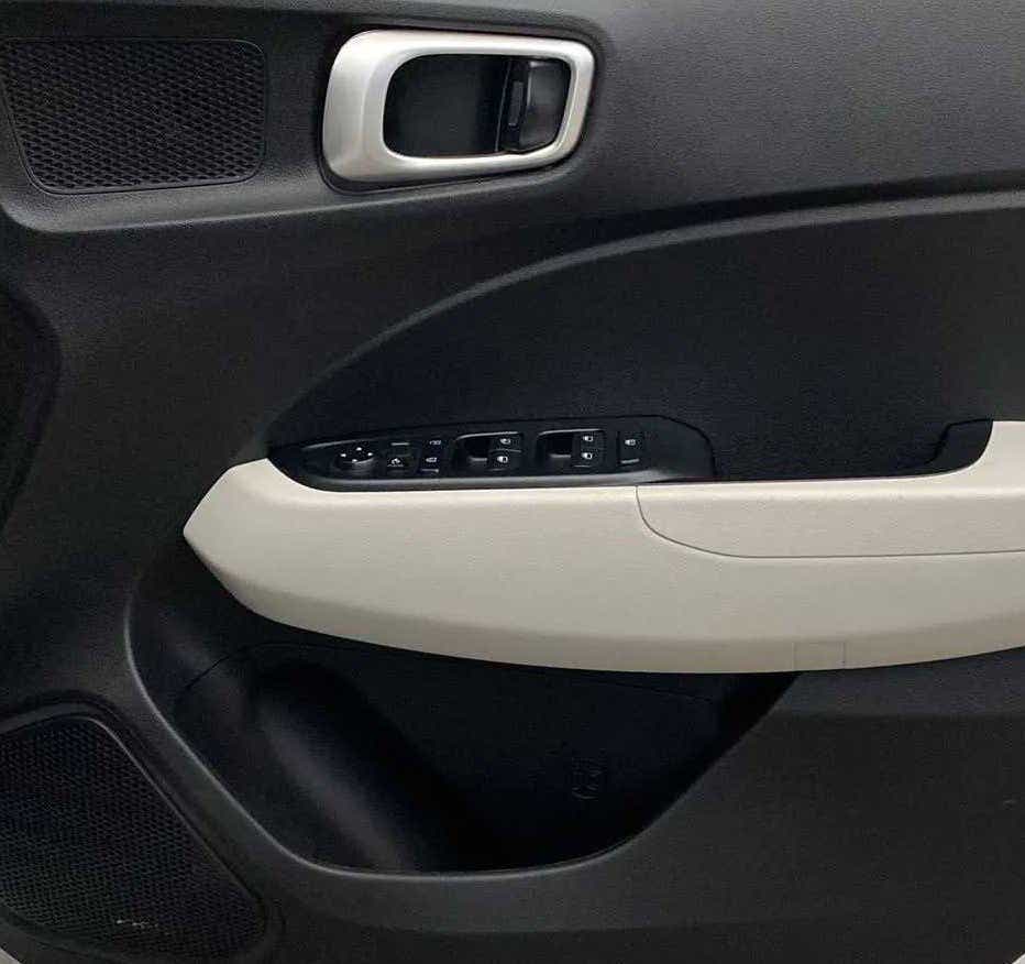 Interior door panel of a Hyundai Venue