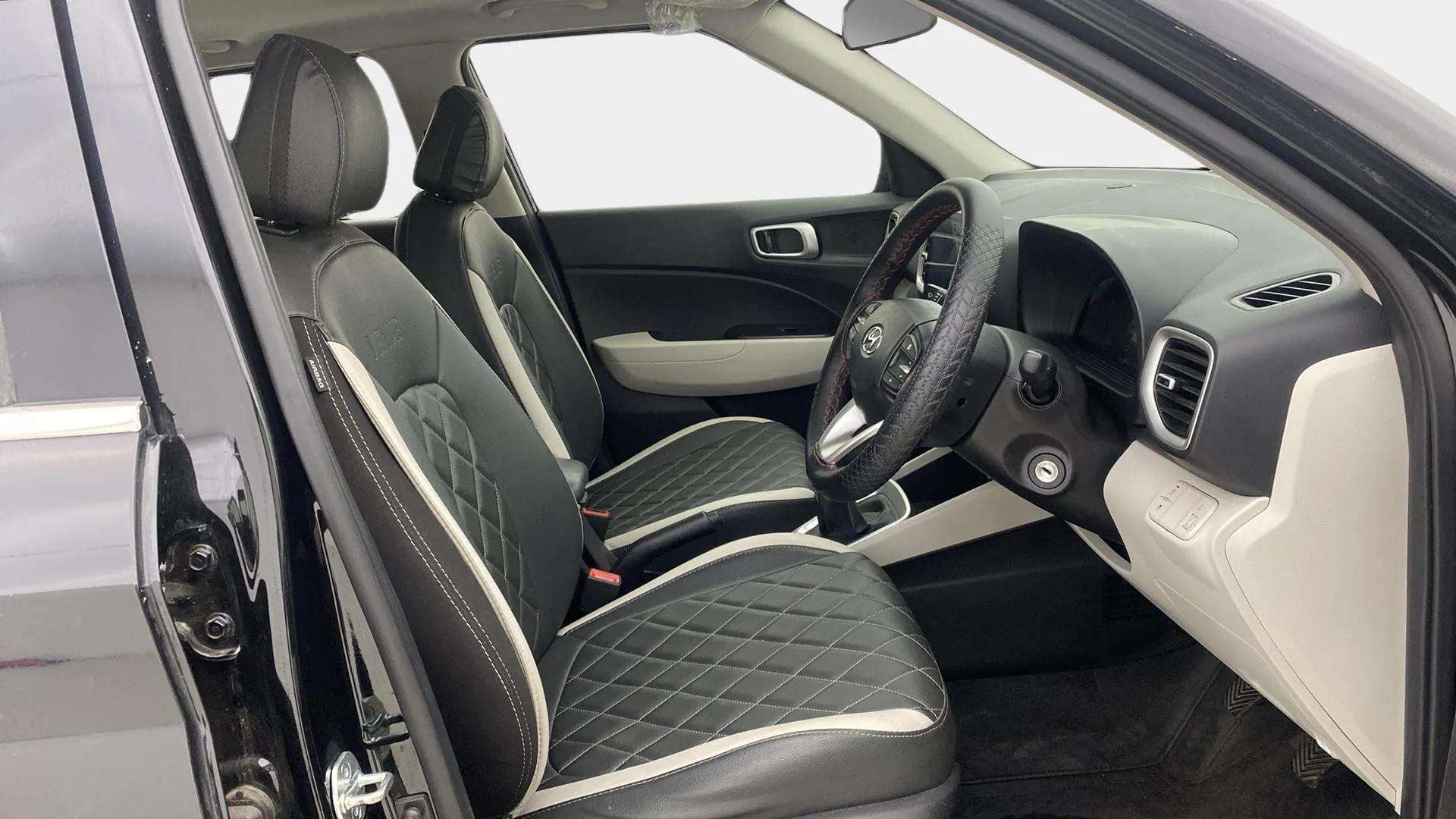 Front driver side interior view of a Hyundai Venue