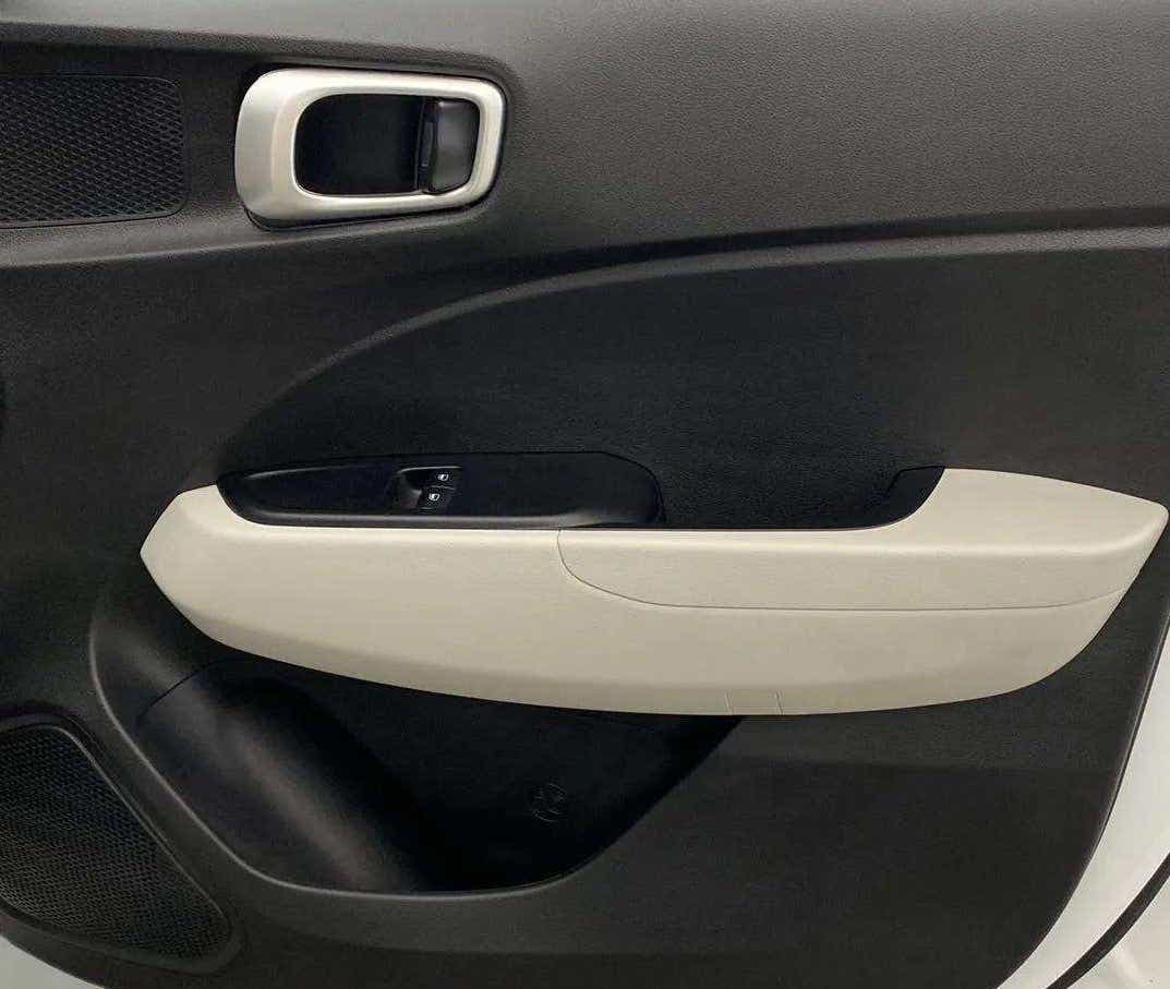 Front interior door panel of a Hyundai Venue