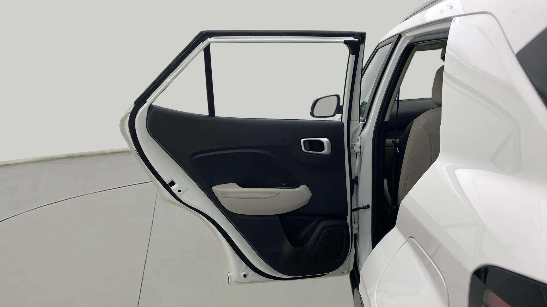 Rear door interior view of a Hyundai Venue