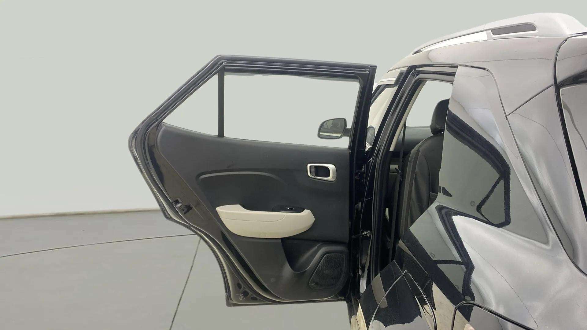 Rear door interior view of a Hyundai Venue