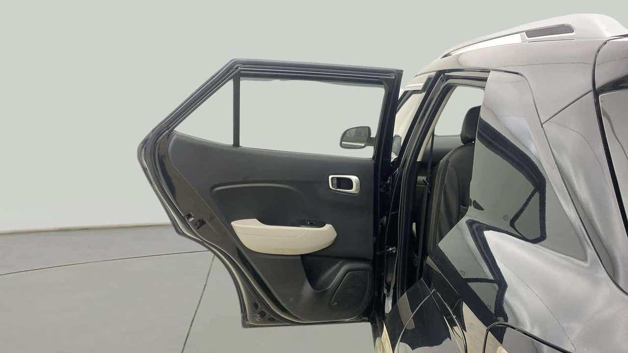 Rear door interior view of a Hyundai Venue