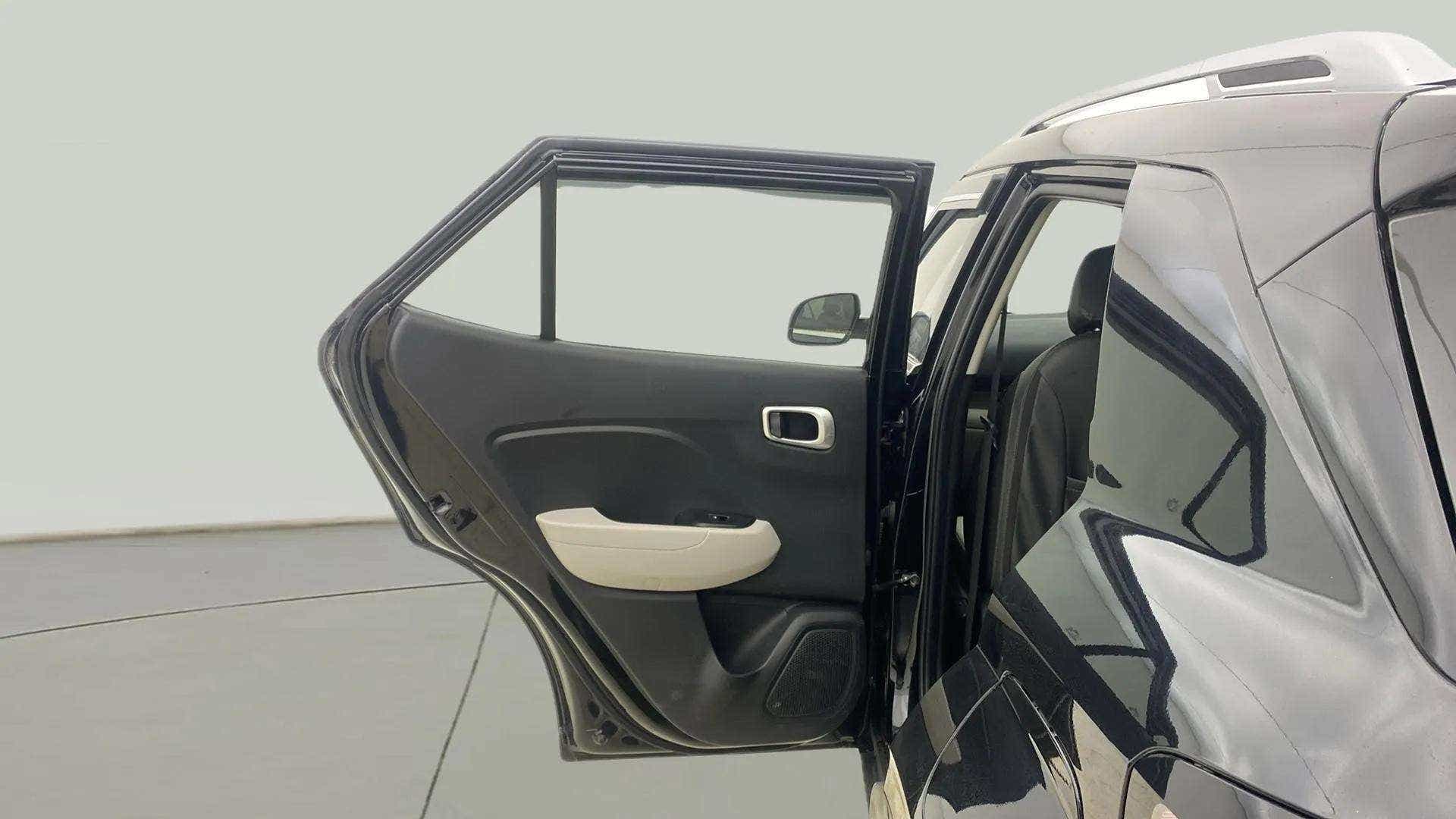 Rear door interior view of a Hyundai Venue