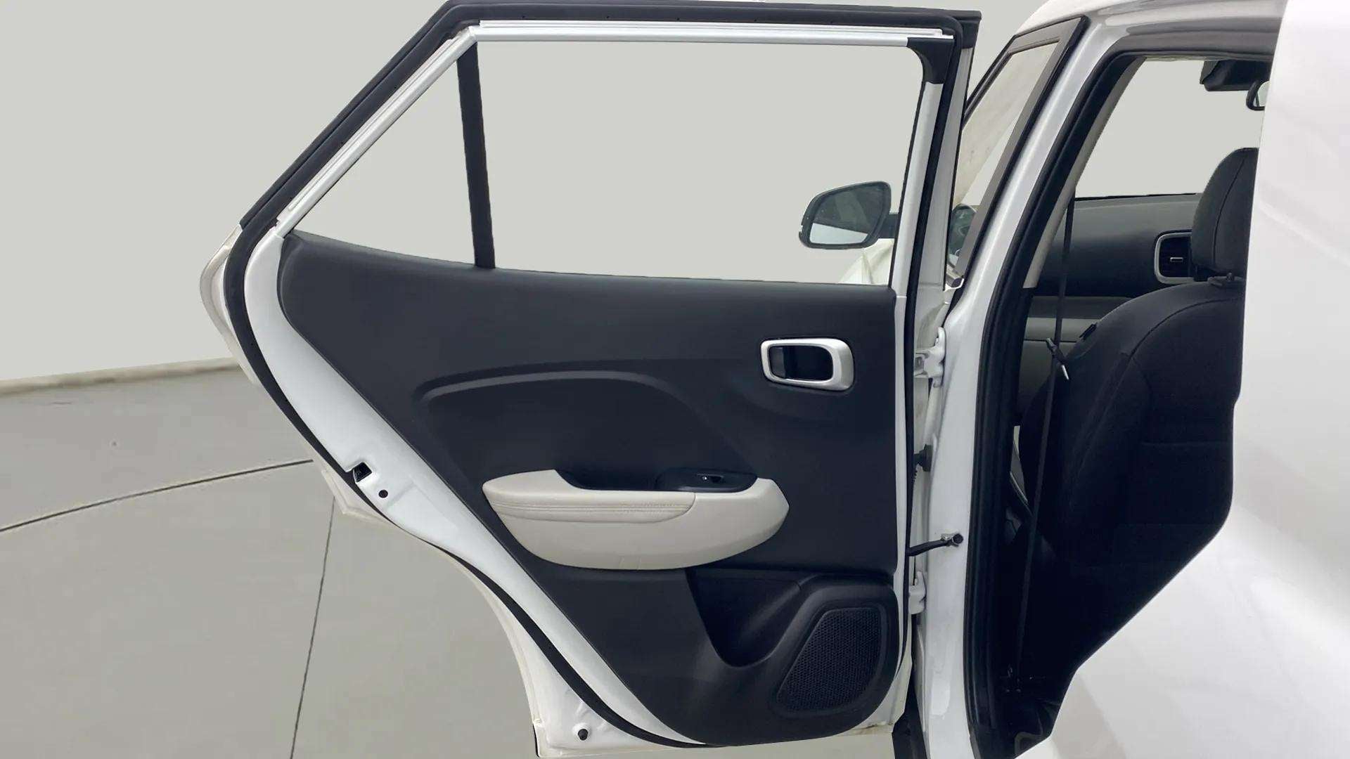 Rear door interior view of a Hyundai Venue
