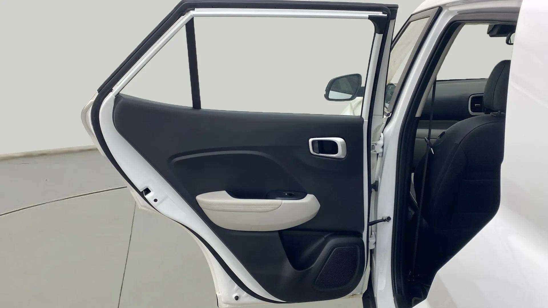 Rear door interior view of a Hyundai Venue