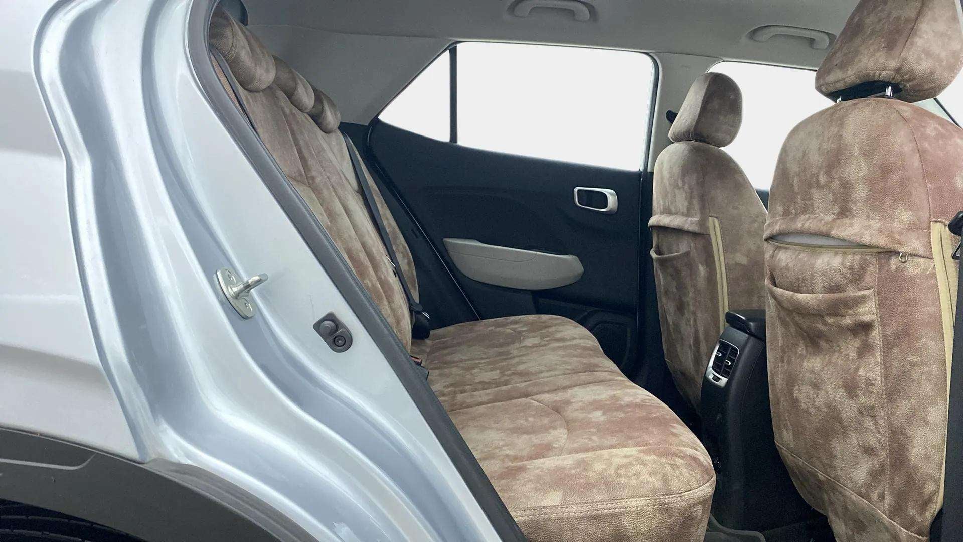Rear seat and door panel view of a Hyundai Venue